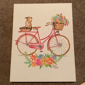 Dog on Bike with Flowers Canvas Art
